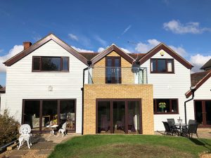 Concrete cladding installation in Theydon Bois, Essex