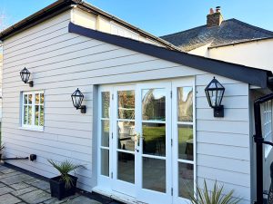 James Hardie cladding installation around French doors