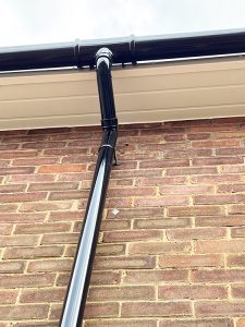 New black UPVC guttering installation