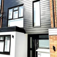 Black PVC Shiplap cladding installation in Loughton, Essex