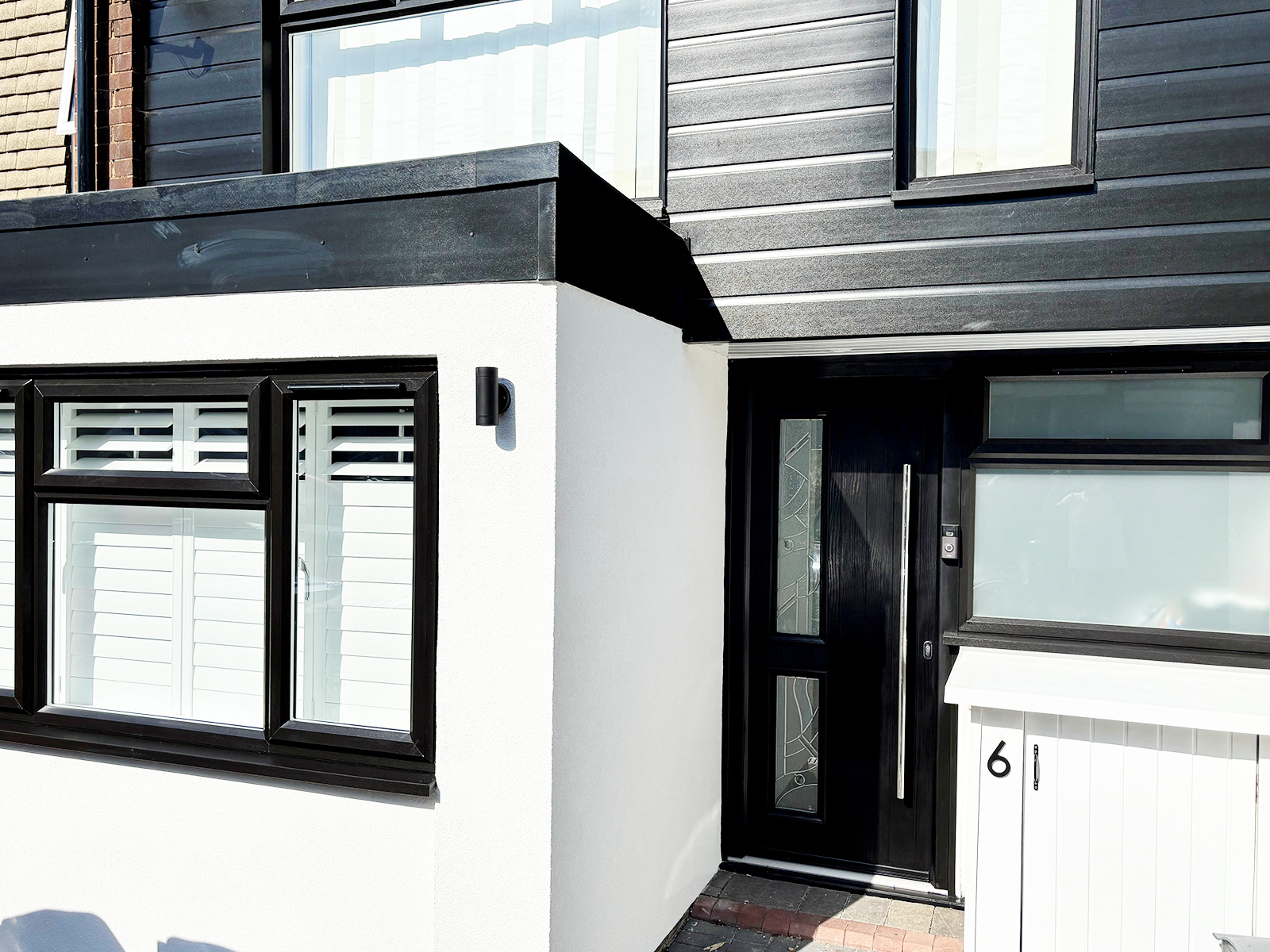 Black PVC cladding installation in Loughton, Essex