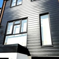 Black PVC cladding installation Loughton, Essex
