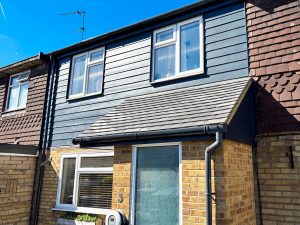 Anthracite grey composite cladding installation in Enfield