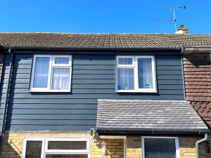 Concrete gutter removal and composite cladding installation in Enfield, North London