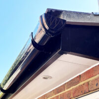 You deep flow guttering in black over new soffits and fascias.