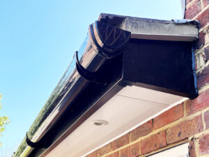 You deep flow guttering in black over new soffits and fascias.
