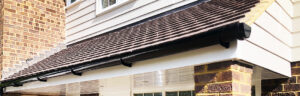 Door canopy installation in North London by Summit Cladding