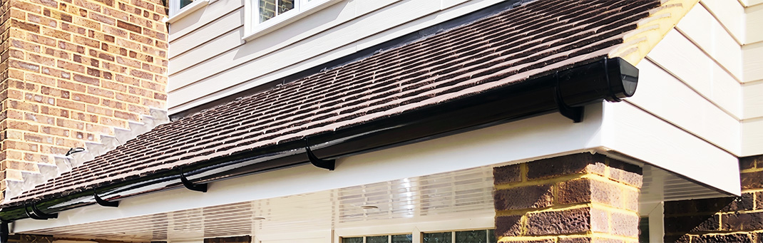 Door canopy installation in North London by Summit Cladding