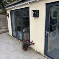 Pre-installation of cladding at rear premises.