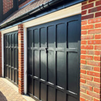 New gutter replacement above repainted garage doors